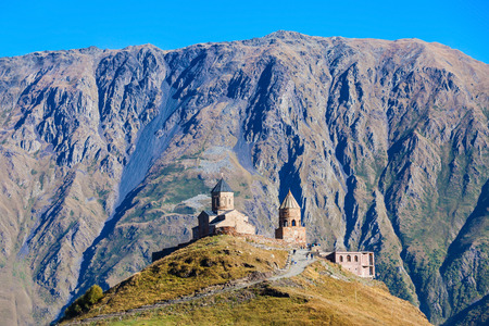 Gergeti Trinity Church (Holy Trinity Church) panoramic view. It is located near the village of...