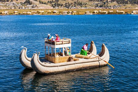 PUNO, PERU - MAY 14, 2015: Totora boat on the Titicaca lake near Puno, Peruのeditorial素材