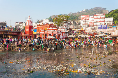 HARIDWAR, INDIA - NOVEMBER 13, 2015: Unidentified people bathing in Ganges river at the Har Ki Pauri...