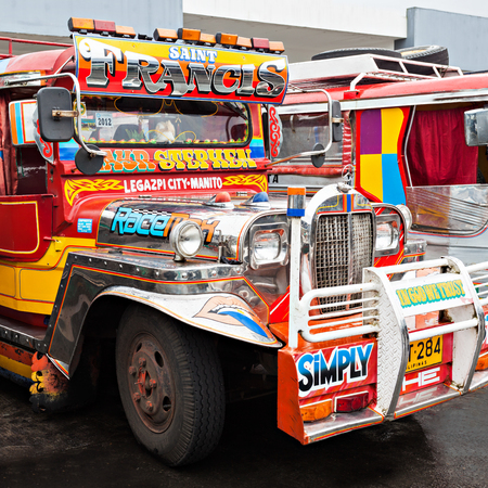 MANILA, PHILIPPINES - FEBRUARY 25: Jeepney on the bus station on February, 25, 2013, Manila, Philippines. Jeepney is a most popular public transport on Philippines.のeditorial素材