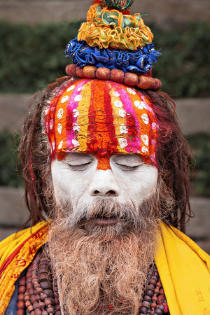 KATHMANDU - APRIL 15: Cremation ceremony along the holy Bagmati River at Pashupatinath Temple complex, April 15, 2012 in Kathmandu, Nepal. This is the most sacred place to all Hindus in Nepal.のeditorial素材