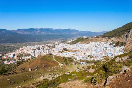 Chefchaouen and Rif mountains aerial panoramic view, Morocco. Chefchaouen is a city in northwest Morocco. Chefchaouen is noted for its buildings in shades of blue.の写真素材