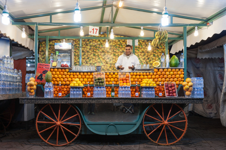 MARRAKECH, MOROCCO - FEBRUARY 22, 2016: Orange juice stall on the Jamaa el Fna square (also Jemaa el-Fnaa, Djema el-Fna or Djemaa el-Fnaa) in Marrakesh.のeditorial素材