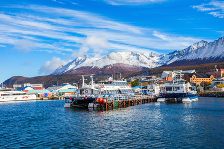 USHUAIA, ARGENTINA - APRIL 15, 2016: Catamaran boats in the Ushuaia harbor port. Ushuaia is the capital of Tierra del Fuego province in Argentina.のeditorial素材