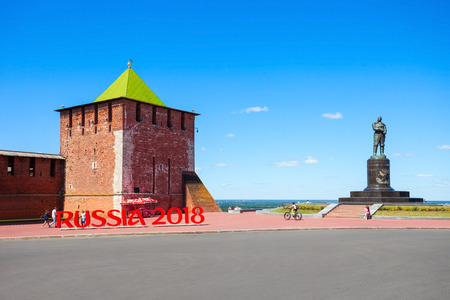 NIZHNY NOVGOROD, RUSSIA - JUNE 29, 2016: Valery Chkalov Monument and Nizhny Novgorod Kremlin tower in Nizhny Novgorod city in Russia. Valery Chkalov is a Hero of the Soviet Union.のeditorial素材