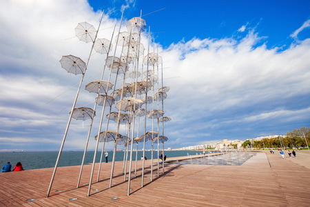 THESSALONIKI, GREECE - OCTOBER 12, 2016: The sculpture Umbrellas by George Zongolopoulos are located at the New Beach in Thessaloniki, Greeceのeditorial素材