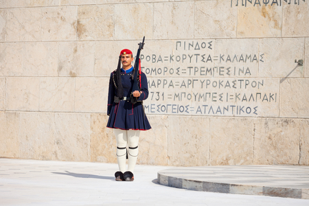 ATHENS, GREECE - OCTOBER 20, 2016: Evzone or Evzoni guarding the Tomb of the Unknown Soldier at the Hellenic Parliament building on Syntagma Square in Athens, Greeceのeditorial素材