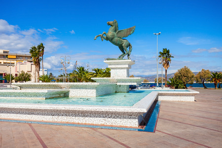 Fountain monument on Corinth seafront in the city center. Corinth is a city and former municipality in Corinthia in Peloponnese peninsula, Greece.の写真素材