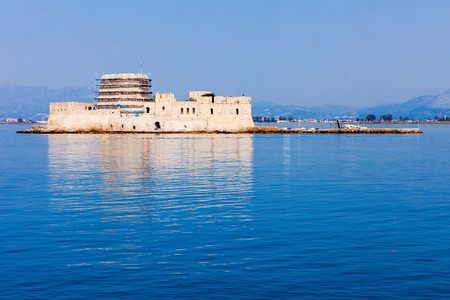 Bourtzi is a water castle located in the middle of Nafplio harbour. Nafplio is a seaport town in the Peloponnese peninsula in Greece.のeditorial素材