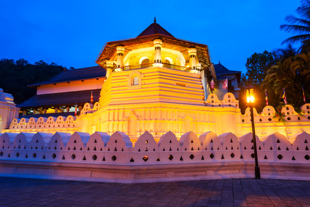 Temple of the Sacred Tooth Relic or Sri Dalada Maligawa in Kandy at sunset. Sacred Tooth Relic Temple is a Buddhist temple located in the royal palace complex of the Kingdom of Kandy.のeditorial素材