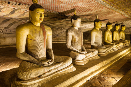 DAMBULLA, SRI LANKA - FEBRUARY 17, 2017: Buddha statues inside Dambulla Cave Temple. Cave Temple is a World Heritage Site near Dambulla city, Sri Lanka.のeditorial素材