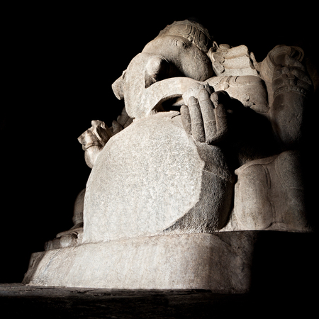 Indian god sculpture at Kadalekalu Ganesha Temple at the Sacred Center around Hampi, Karnataka, Indiaの写真素材