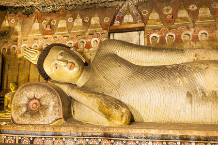 DAMBULLA, SRI LANKA - FEBRUARY 17, 2017: Sculpture of reclining Buddha inside Dambulla Cave Temple.のeditorial素材