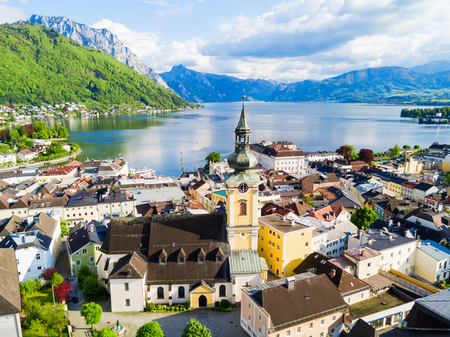 Pfarrkirche catholic parish church in Gmunden city centre and Traunsee lake aerial panoramic view,...
