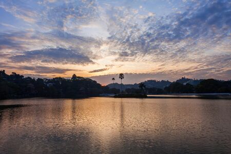 Kandy Lake on sunset. Lake located in Kandy city, Sri Lanka.の写真素材