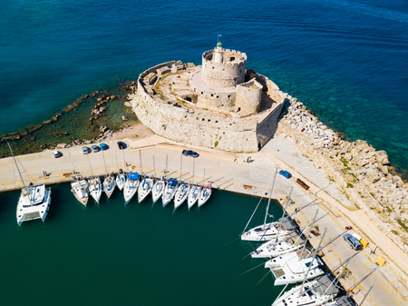 Saint Nicholas Fort guards the Mandraki harbour in Rhodes city, capital of Rhodes island in Greeceの写真素材