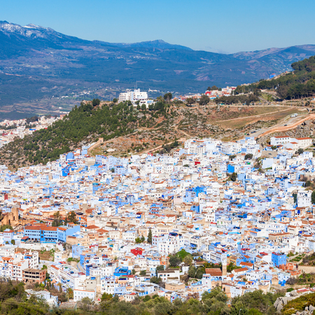 Chefchaouen and Rif mountains aerial panoramic view, Morocco. Chefchaouen is a city in northwest Morocco. Chefchaouen is noted for its buildings in shades of blue.の写真素材