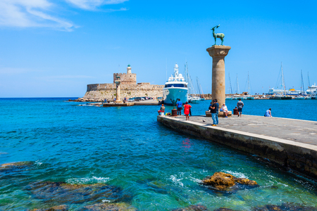 Saint Nicholas Fort guards the Mandraki harbour in Rhodes city, capital of Rhodes island in Greeceの写真素材