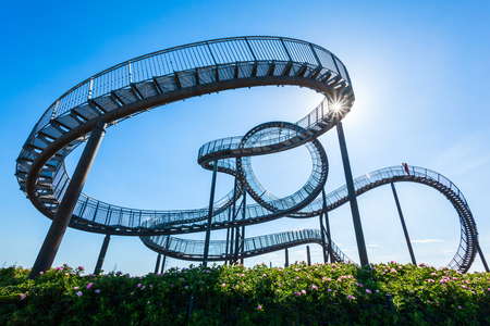 DUISBURG, GERMANY - JULY 03, 2018: Tiger and Turtle or Magic Mountain is an art installation and landmark in Angerpark, Duisburg city in Germanyのeditorial素材
