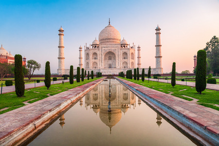 Taj Mahal is a white marble mausoleum on the bank of the Yamuna river in Agra city, Uttar Pradesh state, India