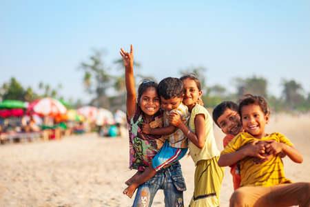 GOA, INDIA - NOVEMBER 08, 2011: Unidentified indian children playing at the beach in Goa in India
