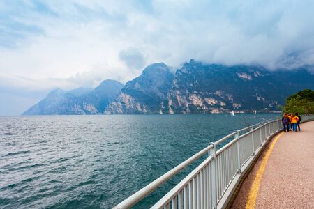 Tip of the Lake Garda, view fron the Riva del Garda town in the Trentino Alto Adige region in Italy.の写真素材
