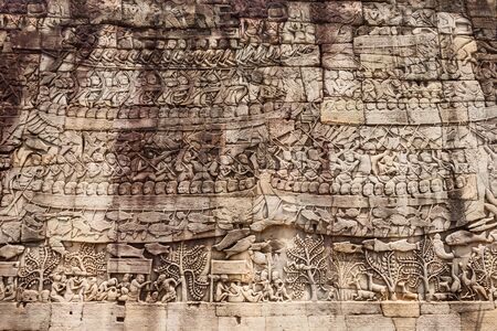 Relief panel at Bayon Temple. Bayon is a well known khmer temple at Angkor in Cambodia.の写真素材