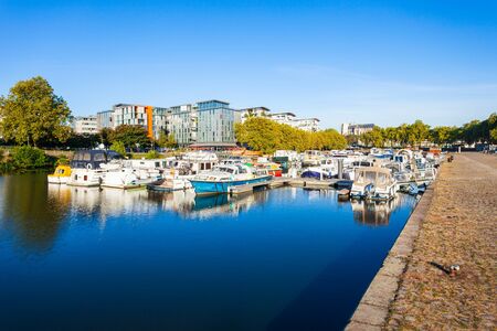 Boats and yachts on the Erdre river dock in Nantes city, Franceの写真素材