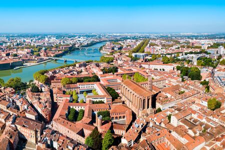 Toulouse and Garonne river aerial panoramic view. Toulouse is the capital of Haute Garonne department and Occitanie region in France.の写真素材