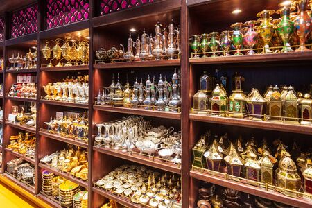 DUBAI, UAE - MARCH 02, 2019: Traditional arabic tea pot souvenir in the duty free zone in the Dubai International Airport in UAEのeditorial素材