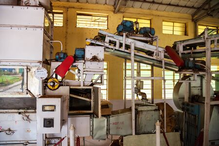 MUNNAR, INDIA - MARCH 16, 2012: Machines inside tea factory in Munnar town in Indiaのeditorial素材