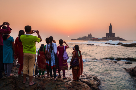 Unidentified tourists looking for sunrise at Kanyakumari city cape in Tamil Nadu state in Indiaのeditorial素材