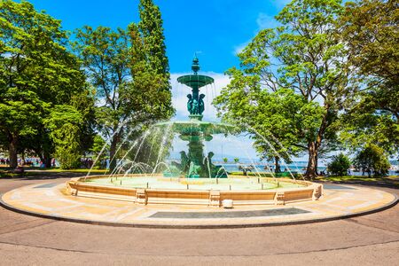 Fountain in the Jardin anglais or English garden, a public park on the shore of Geneva lake in Geneva city in Switzerlandの写真素材