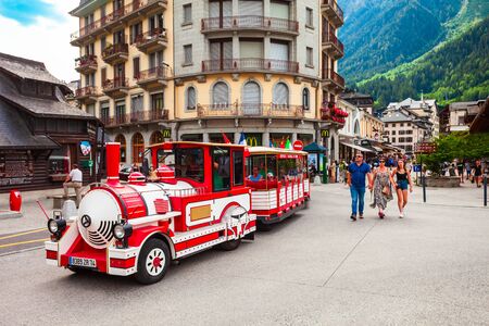 CHAMONIX, FRANCE - JULY 18, 2019: Tourist train in Chamonix city centre. Chamonix Mont Blanc is a...