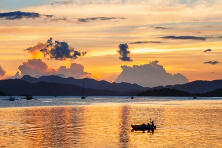 Coron town seacoast at sunset, Busuanga island in Palawan province in Philippinesの写真素材