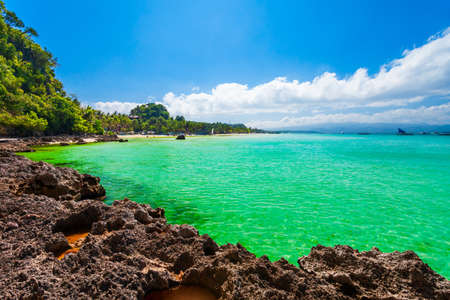 Rocky beach with turquoise water in Boracay island in Philippines
