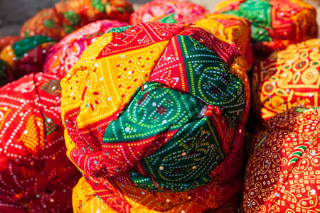 Traditional rajasthani style turbans in the market in Jaislamer city in Rajasthan state of Indiaの写真素材