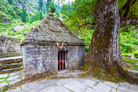 Shiva temple near Yogini waterfall near Vashisht and Manali village in Himachal Pradesh in north Indiaの写真素材