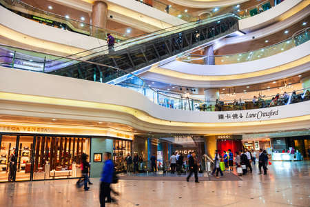 HONG KONG - MARCH 19, 2013: Times Square shopping mall interior. Times Square is a shopping centre and office tower complex in Causeway Bay, Hong Kong in China.のeditorial素材