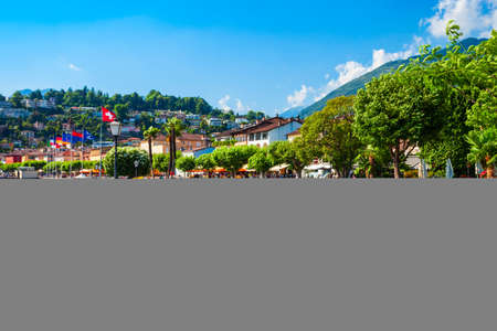 Waterfront promenade and park in Ascona near Locarno, a town located on the shore of Lake Maggiore in the Ticino canton in Switzerland.の写真素材