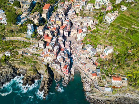 Riomaggiore aerial panoramic view. Riomaggiore is a small town in Cinque Terre national park, La Spezia province in Liguria Region, northern Italyの写真素材