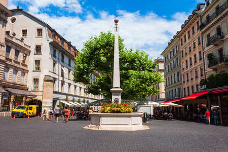 GENEVA, SWITZERLAND - JULY 20, 2019: Fountain at the Place du Molard square in the centre of Geneva...