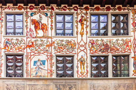 Local houses with paintings at Hirschenplatz main square in Lucerne or Luzern, a city in central Switzerland.のeditorial素材