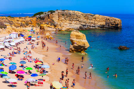 Sao Rafael beach with beauty limestone cliff aerial view, Albufeira city in Algarve region, Portugalのeditorial素材