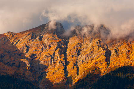 Caucasus mountains around Lake Ritsa in Abkhazia region in Georgia at sunsetの写真素材
