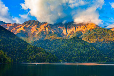 Lake Ritsa panoramic view at sunset. Lake Ritsa is a lake in the Caucasus Mountains in Abkhazia...