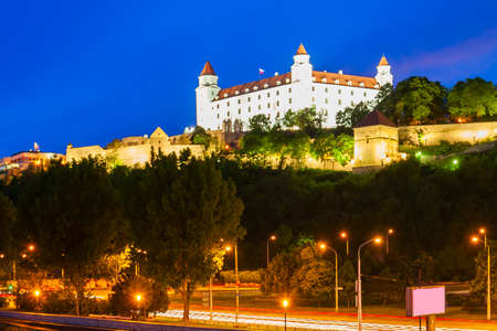 BRATISLAVA, SLOVAKIA - MAY 11, 2017: Bratislava Castle or Bratislavsky Hrad is the main castle of Bratislava in Slovakia at night. Bratislava Castle is located above the Danube river.のeditorial素材