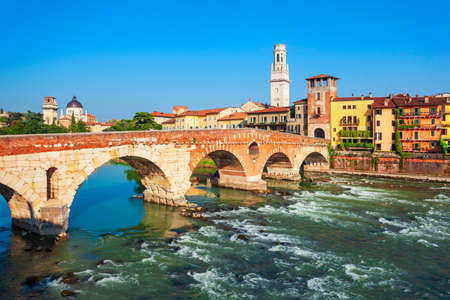 Ponte Pietra bridge is a Roman arch stone bridge crossing the Adige River in Verona, Veneto region in Italyの写真素材