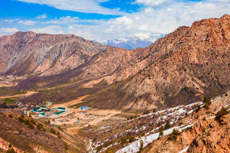 Chimgan ski resort town in the Tian Shan or Tengri Tagh mountain range near Taskent city in Uzbekistan in Central Asiaの写真素材