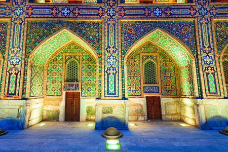 Registan Tilya Kori Madrasah mosaic pattern design background of ceramic tiles in Samarkand city,...